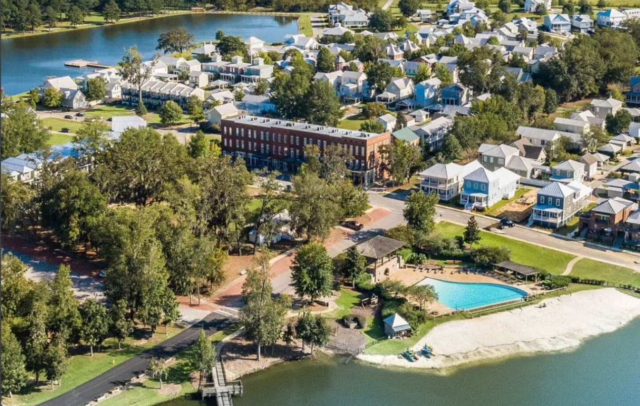 Aerial view of The Waters, its lake, pool and Townsquare