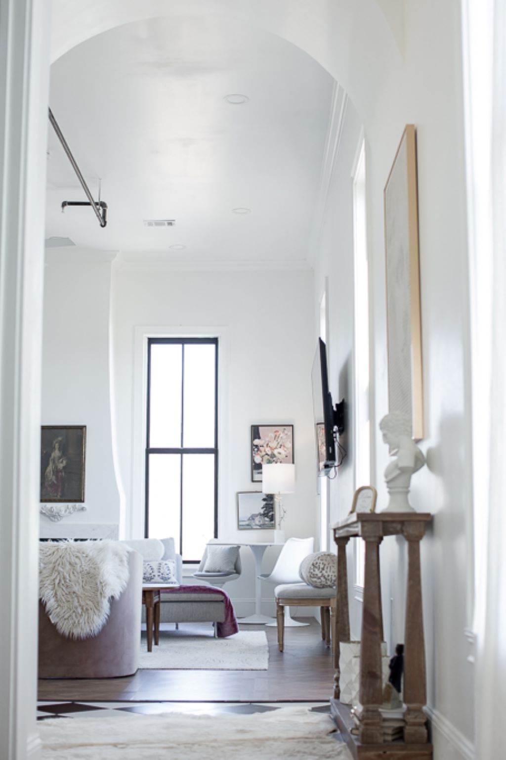 Arched hallway looking into the Anne-Claire living room